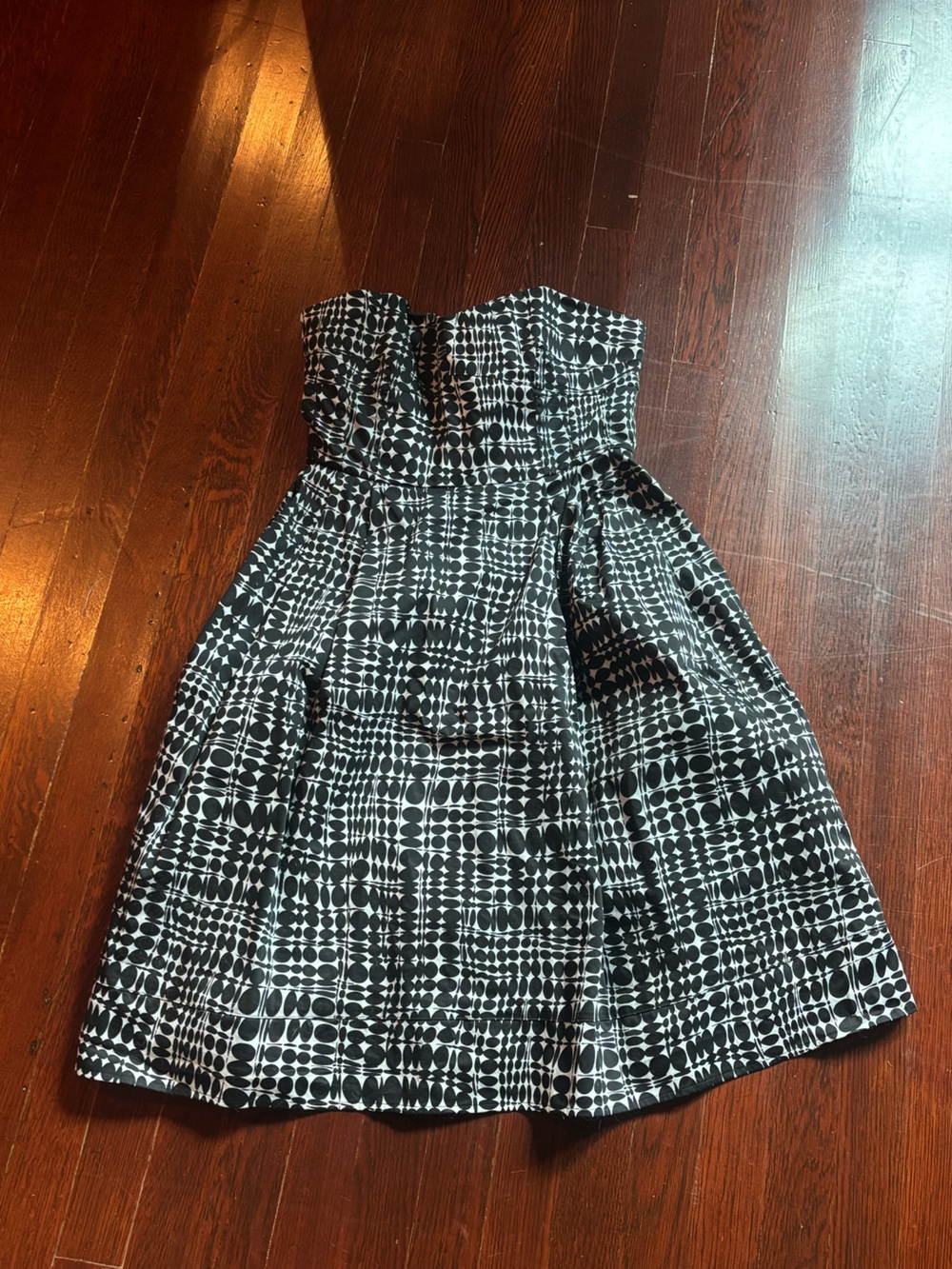 Geometric black and white strapless Calvin Klein dress